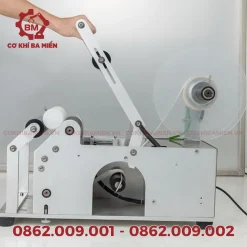 Máy dán nhãn chai tròn bán tự động là dòng máy gì?