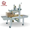 Máy dán thùng carton bán tự động